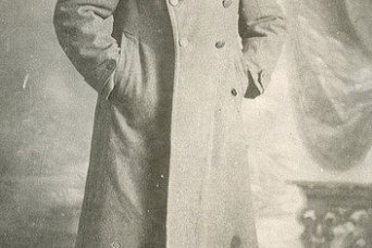 Portrait of Sgt. William Shemin in uniform overcoat is shown.