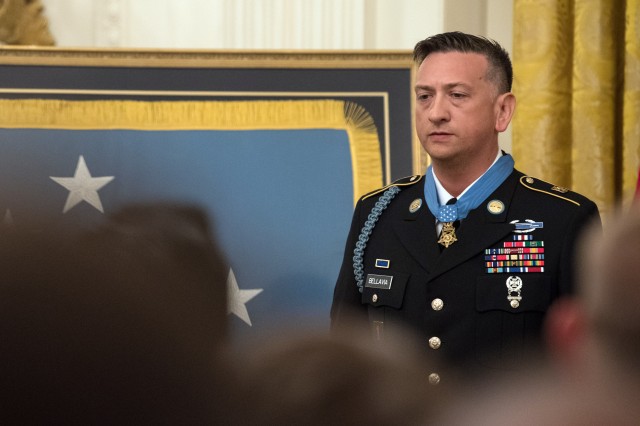 Crowd applauds Medal of Honor recipient