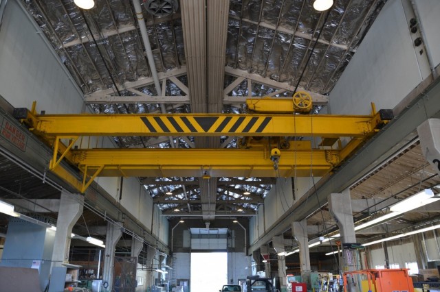 The enormous gantry crane within Building 4, the Machine Shop, is still perched upon its rails.  While no longer in use, the crane will be preserved to convey the design, feeling and association of the industrial repair work once done at Camp Umatilla, Oregon.  