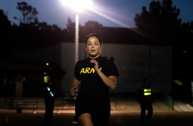A 229th Military Intelligence Battalion Soldier races to the finish of the sprint-drag-carry portion of the Army Combat Fitness Test at the Presidio of Monterey, Calif., Nov. 1, 2019.