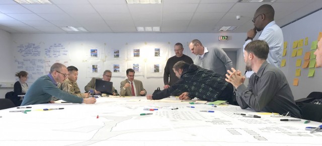 Personnel discuss possible future plans for sections of the camps area of the Grafenwoehr Training Area during collaboration sessions in spring 2019 that were part of creating an Area Development Execution Plan to outline the long-term plan for the area. 