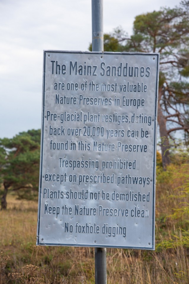 A sign post at one of the entrance paths to the tactical training area at the Mainz Sand Dunes Local Training Area near Mainz, Germany, Oct. 22, 2021 (U.S. Army photo by Alfredo Barraza)