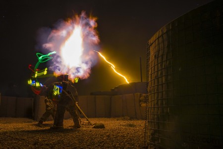 Soldiers fire illumination rounds from a 120 mm mortar during live-fire training in Syria, March 16, 2021.