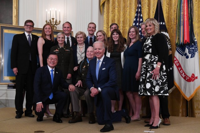 President Joseph Biden presents the Medal of Honor to retired Col. Ralph Puckett Jr. during a ceremony at the White House in Washington, D.C., May 21, 2021. Puckett was awarded the Medal of Honor for his heroic actions while serving then as commander of the Eighth Army Ranger Company when his company of 57 Rangers was attacked by Chinese forces at Hill 205 near the Chongchon River, during the Korean Conflict on November 25-26, 1950.