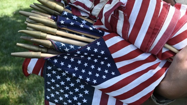 Chaplains and religious affairs specialists from across the Military District of Washington gathered May 27, 2021, at Chaplains Hill, where they honored the fallen buried in Section 2 of Arlington National Cemetery by placing flags at their gravesites prior to Memorial Day weekend in a tradition known as Flags In.