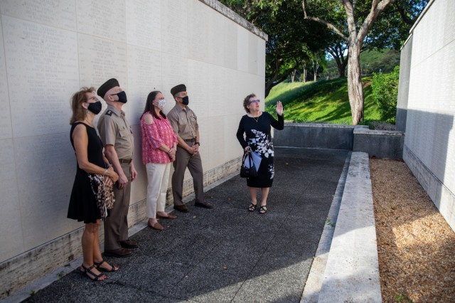 Natalie Rauch, the memorial’s facilitator, explains the memorial’s background at the National Memorial Cemetery of the Pacific May 11 at Punchbowl Crater in Honolulu, Hawaii. Maj. Gen. Tom Solhjem, U.S. Army chief of chaplains, and Regimental Sgt. Maj. Ralph Martinez, the Chaplain Corps senior enlisted advisor, visits the National Memorial Cemetery of the Pacific to honor the memory of the nation’s military veterans and learn about previous chaplains that have sacrificed their lives during the wars. (U.S. Army photo by Sgt. 1st Class Monik M. A. Phan, U.S. Army Pacific Public Affairs)
