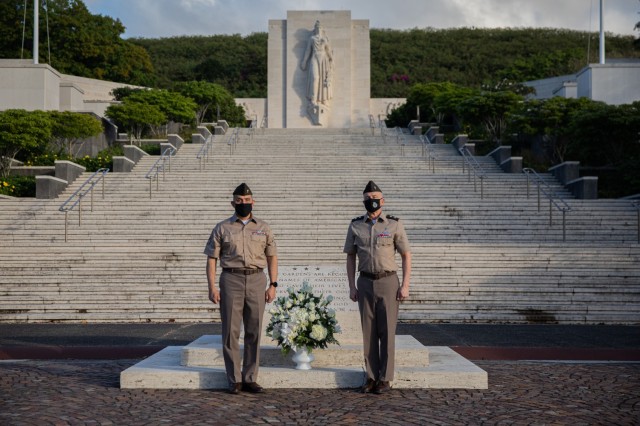 From left to right, Regimental Sgt. Maj. Ralph Martinez, the Chaplain Corps senior enlisted advisor, and Maj. Gen. Tom Solhjem, U.S. Army chief of chaplains, poses for a photo at the National Memorial Cemetery of the Pacific May 11 at Punchbowl Crater in Honolulu, Hawaii. Solhjem and Martinez cemetery visit was to honor the memory of the nation’s military veterans and learn about previous chaplains that have sacrificed their lives during the wars. (U.S. Army photo by Sgt. 1st Class Monik M. A. Phan, U.S. Army Pacific Public Affairs)