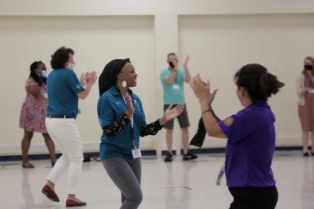 Suicide prevention program trainers lead their training audience in a dance routine following day one of the Stand for Life training event at Camp Bullis, Texas, May 11, 2021. SFL is an Army Reserve interactive suicide prevention training program that trains and prepares Soldiers and Army Civilians, as suicide prevention liaisons, to train and support their local units and Commanders in the event of suicidal ideations or suicide-related events.
(U.S. Army Reserve photo by Anthony L. Taylor)