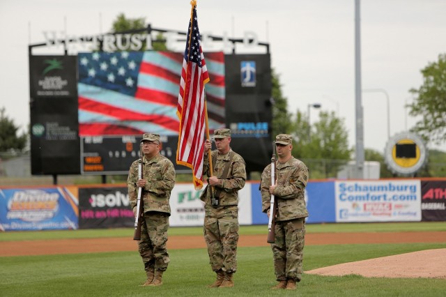The 85th U.S. Army Reserve Support Command color guard team presents the Nation’s Colors during the Schaumburg Boomers’ Memorial Day home game, May 31, 2021, against the Gateway Grizzlies. Soldiers from the 85th USARSC additionally participated in pre-game activities throwing out the ceremonial first pitch. 
(U.S. Army Reserve Photo by Anthony L. Taylor)