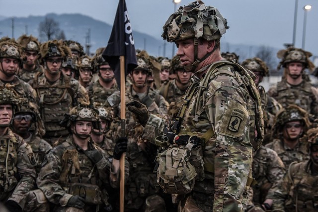 The command sergeant major for the 173rd Airborne Brigade outlines why their training is so tough as the paratroopers look on with enthusiasm at the next challenge. Paratroopers complete a 2.2 mile full combat load run for morning physical training.