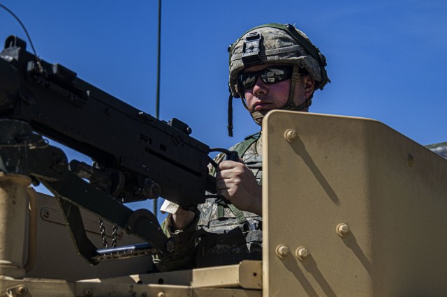 Spc. Kevin Dempsey, a horizontal construction engineer with the 702nd Engineer Company, stands guard at the entrance to Tactical Assembly Area Justice during Warrior Exercise 86-21-02 at Fort McCoy, Wis. 

WAREX 86-21-02, beginning the week of June 8, unites more than 75 U.S. Army Reserve units from across the country. The training events build warfighting functionality, and enhance mission command proficiency in support of the Army Reserve's mission to bring leadership, resilience and execution to the force. (U.S. Army Reserve photo by Sgt. Michael Ito, 364th TPASE)