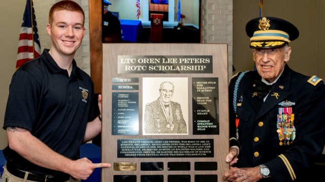 Cadet Zachary Nemecek, left, and retired Lt. Col. Oren Lee Peters pose for a photo during an event at the University of Central Oklahoma June 7. Peters said set up the scholarship program last year to support ROTC cadets because of the impact he feels they will provide for the country. (Photo by KT King/UCO Photo Services)