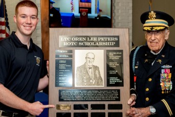 Centenarian WWII and Korea veteran awards scholarship to ROTC Cadet