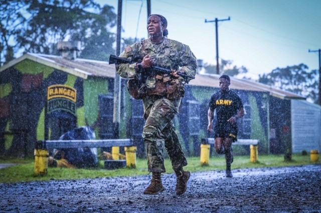 Soldiers complete a 5K race in preparation for a jungle operations training course at Schofield Barracks, Hawaii, May 14, 2021. 