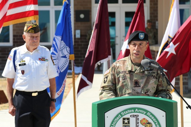 Left, Mr. Doug Miller, the master of ceremony, listens to remarks from Lt. Col. Joseph DaSilva, commander, 2nd Battalion, 327th Infantry Regiment, 1st Brigade Combat Team, 101st Airborne Division during the Spc. Jameson L. Lindskog U.S. Army Reserve Center memorialization ceremony June 29, 2021 at Parks Reserve Forces Training Area in Dublin, Calif. Lindskog, a resident of Pleasanton, Calif., was killed in action March 29, 2011 while serving as a combat medic with the 2nd Bn., 327th Inf. Regmt., 1st BCT, 101st Airborne Division in Afghanistan. He posthumously received the Silver Star for his heroic actions that day.
(Photo by Sgt. 1st Class Matthew Chlosta)