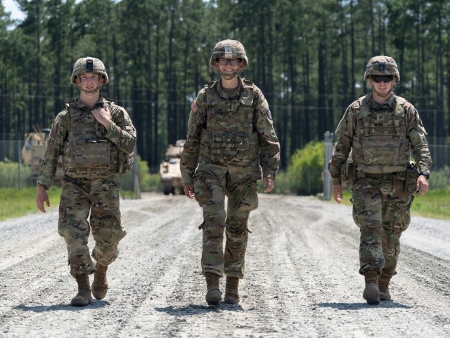 Cadets Paul Budoff, left, Danielle Cross, center, and Annesley Black, right, walk to an M2 Bradley Fighting Vehicle to participate in a gunnery with 9th Brigade Engineer Battalion, 2nd Armored Brigade Combat Team, 3rd Infantry Division, during their Cadet Troop Leader Training at Fort Stewart, Georgia, June 23, 2021. CTLT gives cadets from West Point and ROTC the opportunity to experience leadership and a day-in-the-life of Army second and first lieutenants in active-duty units every summer. (U.S. Army by photo Spc. Devron Bost)