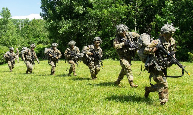 Class of 2024 cadets perform an air assault movement from Landing Zone Bull to Landing Zone Owl, in response to a fragmentary order issued to the Company Commander, Class of 2022 Cadet Casey Komar, during the end of the Field Training Exercise on June 23 near Camp Buckner.