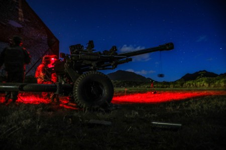 Soldiers conduct M119 Howitzer night live-fire training at Schofield Barracks, Hawaii, May 19, 2021.
