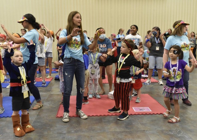 More than 100 children are participating in Vacation Bible School this week at the Main Post Chapel, hosted by Fort Leonard Wood’s Religious Support Office. The children are supervised by a group of about 45 volunteers as they rotate through various games, crafts and Bible story stations while divided into age groups ranging from preschoolers through sixth grade. Different themes each day have the children and volunteers dressing as pirates, island vacationers and in team colors.