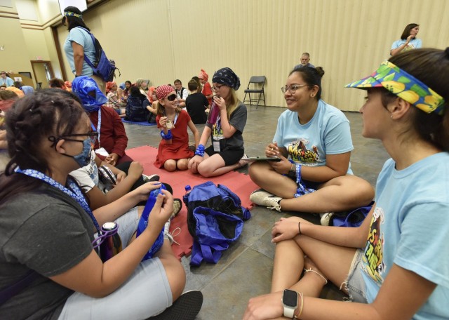 More than 100 children are participating in Vacation Bible School this week at the Main Post Chapel, hosted by Fort Leonard Wood’s Religious Support Office. The children are supervised by a group of about 45 volunteers as they rotate through various games, crafts and Bible story stations while divided into age groups ranging from preschoolers through sixth grade. Different themes each day have the children and volunteers dressing as pirates, island vacationers and in team colors.