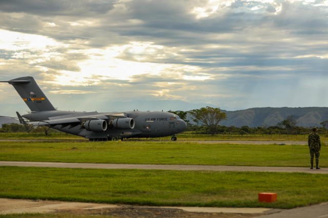 A U.S. Air Force C17 Globemaster III lands at Tolemaida Air Base, Nido, Colombia, July 21, 2021. The C17 carried U.S. Army paratroopers assigned to 2nd battalion, 501st Parachute Infantry Regiment, 1st Brigade Combat Team, 82nd Airborne Division for a Dynamic Force Employment with the Colombian military. (U.S. Army photo by Pfc. Joshua Taeckens)(This photo was edited from the original version)