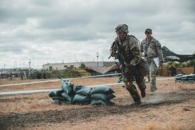 Sgt. Mark Lopez, 3rd Armored Brigade Combat Team, 1st Cavalry Division, rushes to a firing position during the patrolling portion of the coveted Expert Soldier Badge (ESB) and Expert Infantry Badge (EIB) qualification, Fort Hood, Texas, August 26, 2020. The ESB and EIB qualification tests the Soldiers knowledge on basic Infantry and basic Soldier skills. If they qualify, they will be awarded the title “expert” in their field. 