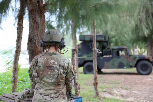 Ohio National Guard's Sgt. Saylor Knebel, assigned to Charlie Battery, 1st Battalion, 174th Air Defense Artillery Regiment, operates the Avenger Air Defense System remotely during exercise Forager 21 on July 30, 2021, Tinian, Northern Mariana Islands. The Avenger is a self-propelled surface-to-air missile system which provides mobile, short-range air defense protection for ground units. Exercise Forager 21 is an opportunity for U.S. Army Pacific to integrate innovation and experimentation across the multi-domain force in an archipelagic environment. (Photo by Army Spc. Olivia Lauer)
