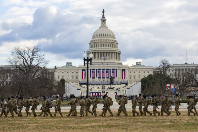 National Guard Soldiers provide security outside the U.S. Capitol during the 59th Presidential Inauguration Jan. 20, 2021, as part of the National Guard’s Capitol Response security mission. More than 26,000 National Guard members from all states and territories mobilized to Washington, D.C., to support the inauguration. 