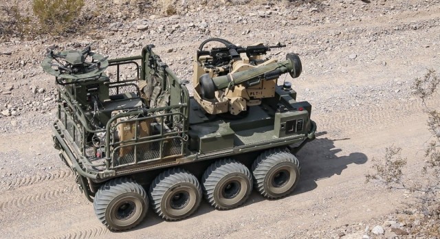 A U.S. Army autonomous weapons system, known as Origin, maneuvers through desert terrain as weapons testing commences during Project Convergence 20 at Yuma Proving Ground, Ariz., Aug. 25, 2020. During Project Convergence 21 in November, the Army will collaborate with five other military branches including the newly-formed Space Force. 