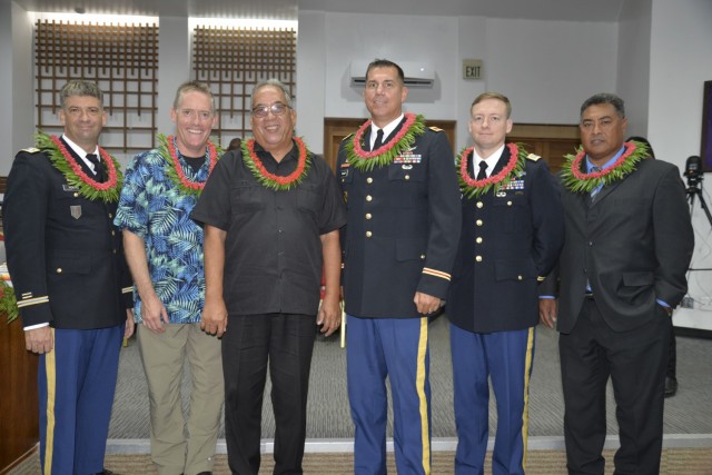 From left to right: Lt. Col. Dan Young, USAG-KA director of Host Nation Activities; Dr. Nick Bird, chief medical officer at  the Kwajalein Hospital; Lanny Kabua, RMI liaison officer to USAG-KA; Col. Thomas Pugsley, USAG-KA commander; Maj. Jay Parsons, incoming director of Host Nation Activities; and Mike Sakaio, USAG-KA RMI relations specialist, attend the opening day of the Nitijela at the International Conference Center in Majuro Aug. 9, 2021.