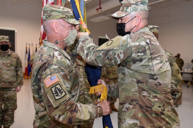 Incoming Command Sgt. Maj. Steven J. Slee, left, receives the colors from Brig. Gen. Ernest Litynski, Commanding General, 85th U.S. Army Reserve Support Command. Slee assumed command of the 85th USARSC, August 14, 2021. 
(U.S. Army Reserve photo by SSG Erika F. Whitaker)