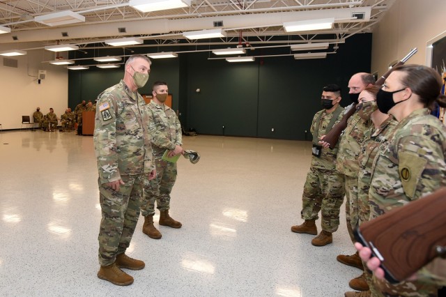 Command Sgt. Maj. Andrew J. Lombardo, left, Command Sergeant Major, U.S. Army Reserve, meets with Soldiers assigned to the 85th U.S. Army Reserve Support Command during a change of responsibility ceremony, August 14, 2021.  Command Sgt. Maj. Steven J. Slee assumed responsibility of the 85th USARSC from Command Sgt. Maj. Theodore H. Dewitt in Arlington Heights, Illinois. 
(U.S. Army Reserve photo by SSG Erika F. Whitaker)