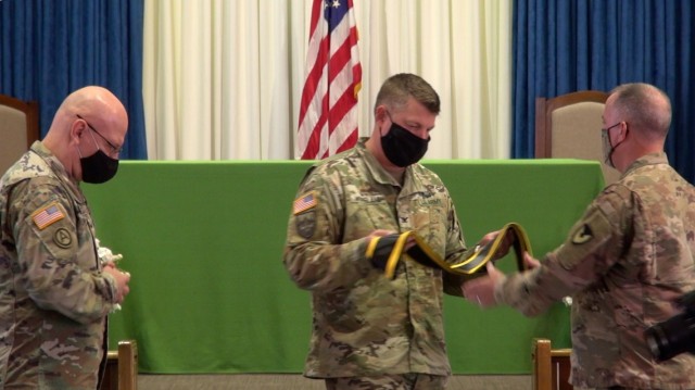 (left) Col. Jarrod Moreland, Commander, U.S. Army Garrison-Fort Huachuca presents  a stole to Chaplain (Lt. Col.) Shay Worthy the incoming Garrison Chaplain at a ceremony at the Main Post Chapel.  