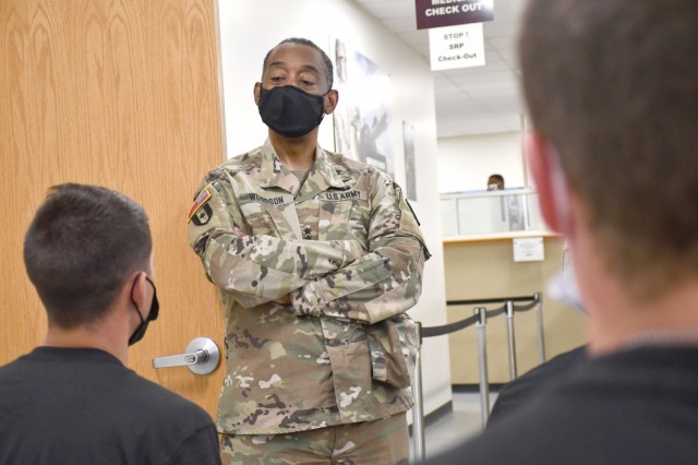 Maj. Gen. Jonathan Woodson, commanding general, Army Reserve Medical Command, speaks with cadets while touring the Soldier Readiness Processing site for the 2021 Cadet Summer Training on Monday, July 12. The SRP site is a part of the ARMEDCOM medical support offered annually to the Fort Knox, Ky. training exercise, and ensures cadets are medically safe to train in the exercise and ready for commissioning. The CST is the largest annual training exercise executed by the U.S. Army, graduating almost 10,000 Cadets from Advanced Camp or Basic Camp each summer. More than 250 ARMEDCOM Soldiers have provided support to the exercise, including medics, physicians, x-ray technicians, pharmacy technicians and lab technicians.