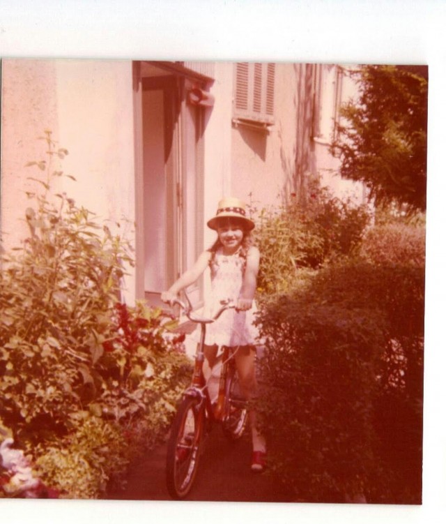 Natalie Clarke-Knight rides her bike as a young girl in  Schwäbisch Gmünd.