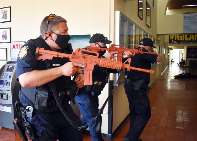 Members of the Presidio of Monterey Police Department participate in an active-shooter response drill at the Price Fitness Center, Presidio of Monterey, Calif., Aug. 5, 2021.