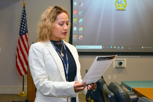 Janice Quenga, U.S. Army Garrison Presidio of Monterey antiterrorism officer, reads the Antiterrorism Awareness Month Proclamation at garrison headquarters, Presidio of Monterey, Calif., Aug. 24.