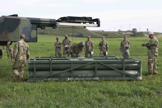Members of the U.S. Army’s Bravo Battery, 4th Battalion, 4th Security Forces Assistance Brigade, evaluate operations of the High Mobility Artillery Rocket System while attending the Combined Duties Training Course hosted by the 2nd Battalion 196th Regiment (Regional Training Institute), South Dakota National Guard, Aug. 28, 2021, in Sioux Falls, S.D. The training prepared 4-4th SFAB for deployment to Europe. (Photo by Staff Sgt. Dustin Jordan)