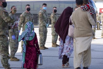 Afghan evacuees arrive in Indiana, head to Camp Atterbury