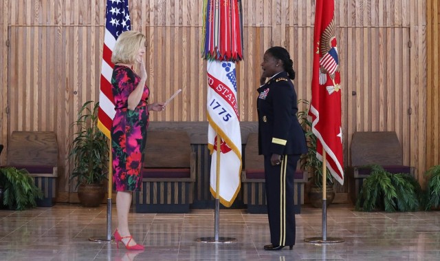 Secretary of the Army Christine E. Wormuth, left, swears in Lt. Gen. Donna Martin as the Army&#39;s inspector general during a ceremony Sept. 2, 2021. Martin previously spent a year as the Army&#39;s provost marshal general. 