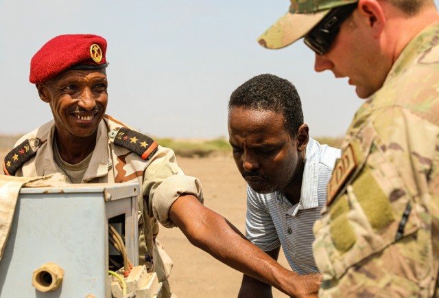 Capt. Le Mohamed Louaita, commander for Djiboutian Demining Company, expresses gratitude to Tech. Sgt. Dylan Wagner, explosive ordnance disposal technician, 123rd Airlift Wing, Aug. 22, 2021, in Djibouti City, Djibouti. Kentucky National Guard Engineers with the 577th Sapper Company and 123rd Airlift Wing trained with the Djiboutian military as a part of the State Partnership Program. 