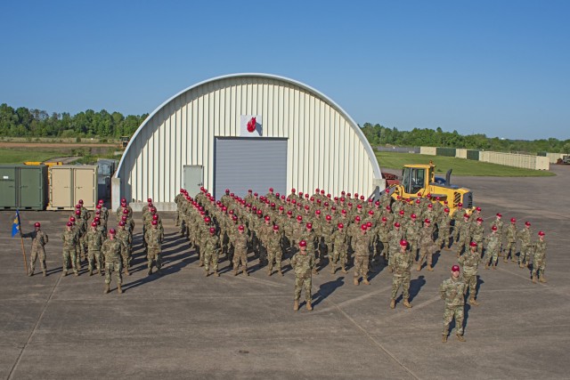 Members of the 201st Rapid Engineer Deployable Heavy Operational Repair Squadron Engineers, or REDHORSE, Detachment 1 pose for a picture at Biddle Air National Guard Base in Horsham, Pennsylvania, May 15, 2021. This is the first official group photo of the 201st REDHORSE Det. 1 in the Operational Camouflage Pattern, or OCP, utility uniform on base since they returned from their recent deployment overseas. (U.S. Air National Guard Photo by Senior Airman Wilfredo Acosta)