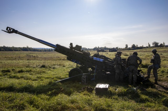 Soldiers with Archer Battery, Field Artillery Squadron, 2nd Calvary Regiment, prep their assigned M777A2 Howitzer during the live-fire exercise Saber Junction 21 Sept. 1, 2021, in Grafenwoehr Training Area, Germany. The U.S. Army Europe and Africa directed exercise is designed to assess the readiness of units under 7th Army Training Command to conduct unified land operations in a joint, combined environment and to promote interoperability with participating Allies and partner nations. (U.S. Army photo by Spc. Nathaniel Gayle)