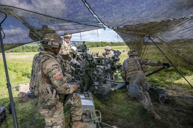 Soldiers with Archer Battery, Field Artillery Squadron, 2nd Calvary Regiment, load their assigned M777A2 Howitzer before firing during the live-fire exercise Saber Junction 21 Sept. 1, 2021, in Grafenwoehr Training Area, Germany. The U.S. Army Europe and Africa directed exercise is designed to assess the readiness of units under 7th Army Training Command to conduct unified land operations in a joint, combined environment and to promote interoperability with participating Allies and partner nations. 