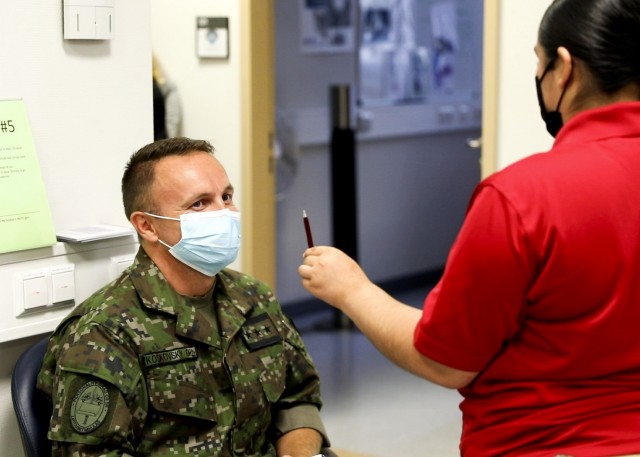 Medical professionals of the Slovak Republic Armed Forces visit with Landstuhl Regional Medical Center trauma specialists during a military medical expert exchange at LRMC, Aug. 19.