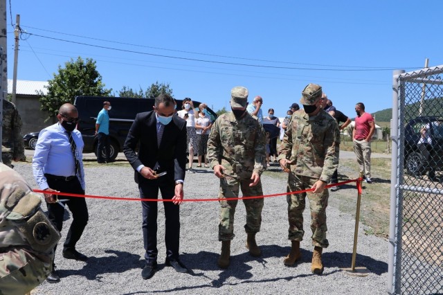 U.S. Army Corps of Engineers Caucasus Project Office Chief Jorge Pachas, Mtskheta Mtianeti Georgain State Representative David Nozadze, Adjutant General of the Georgia National Guard Maj. Gen. Thomas Carden and Maj. Dan Sekula of the Office of Defense Coordination in the U.S. Embassy in Tbilisi, Georgia cut the ceremonial ribbon during a ceremony recognizing the completion of a newly constructed water storage tank and electric-powered pump station serving the Prezeti Internally Displaced Persons settlement in the Mtskheta region of the Republic of Georgia. The U.S. Army Corps of Engineers, Europe District recently completed the water supply project through the U.S. European Command’s Humanitarian Assistance program, in close coordination with the U.S. Embassy in Tbilisi. (Photo courtesy of the U.S. Embassy in Tbilisi)