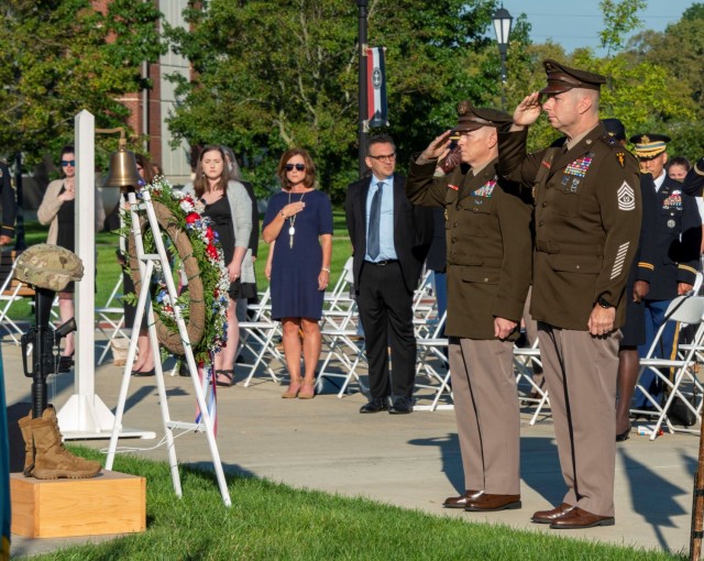 US Army War College Commandant Maj. Gen. David Hill (L) and Command Sgt. Major Brian Flom give honors at the wreath to the fallen of Sept. 11, 2001, at Carlisle, Pa.