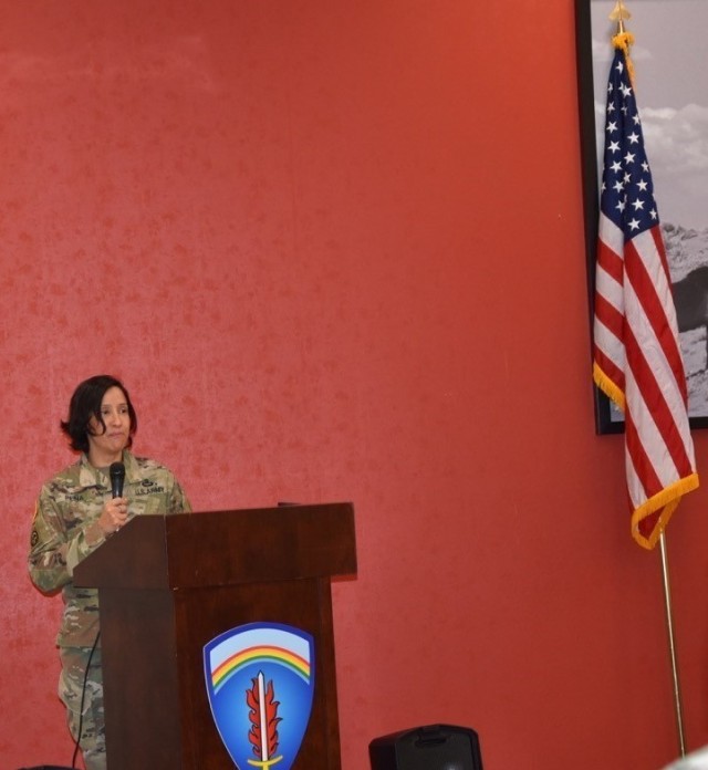 Lt. Col. Claudia Pena with G5, U.S. Army Europe-Africa, speaks at the Women’s Equality Day ceremony at the dining facility Aug. 26 at Clay Kaserne.
