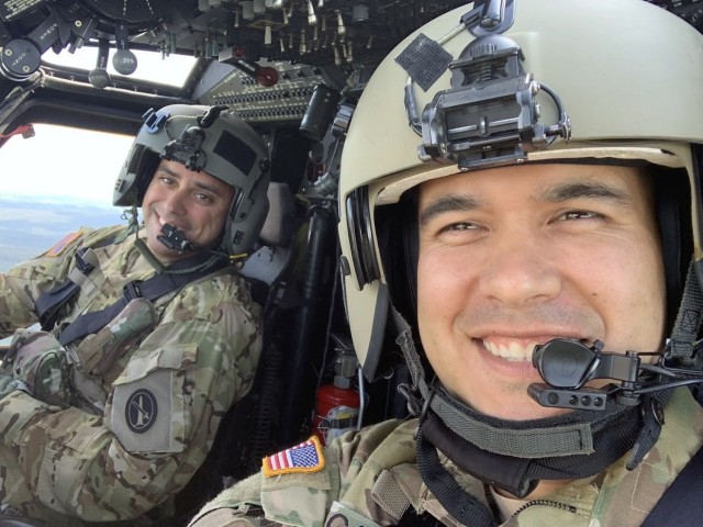 U.S. Army Chief Warrant Officer 3 Mauricio Garcia, right, pilots a 12th Aviation Battalion UH-60M Black Hawk, with his co-pilot, Chief Warrant Officer 3 Kevin Wikstrom.