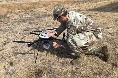 Sgt. Traice R. Prentice, a U.S. Army Explosive Ordnance Disposal technician from the 707th Ordnance Company (EOD), prepares a Skyraider Unmanned Aerial System during field testing on Joint Base Lewis-McChord, Washington.  The company was one of the first EOD companies to field the UAS system.  U.S. Army photo by Sgt. 1st Class Jeremy M. Walsh.